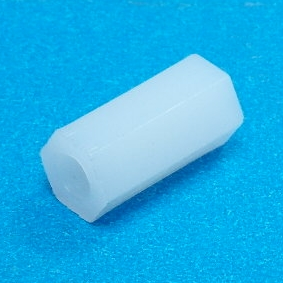 Espaceur hexagonal en plastique de 12 mm
